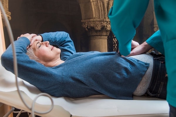 Woman being checked by a doctor